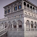 Ancient Architecture With Two Story Arched Doors Balconies Stone Railings And Staircase