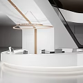 Modern Circular White Reception Desk With Ambient Lighting And Nearby Staircase