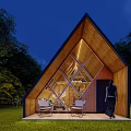 Wooden A-frame Cabin in Scenic Green Surroundings With Outdoor Porch and Chairs