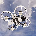 Quadcopter Drone With White Body Four Propellers And Red Centers 3d model