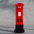Red Post Box Commercial Equipment Featuring ER Logo and Gray Brick Wall Background 3d model