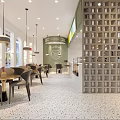 Modern Milk Tea Shop Interior With Seating Area Green Accents And Decorative Grid Wall