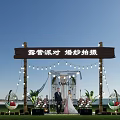 Wedding Photography at Camping Party with Wooden Arch String Lights Sunset Sky and Hanging Chairs