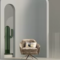 Beige Armchair with Pillow on Modern White Display Platform Featuring Green Cactus and Arched Structure