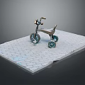 Children's Tricycle Displayed On Gray Brick Platform Against Gray Background