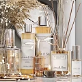 Stylish Bathroom Accessories With Reed Diffusers Fragrance Bottles And Decorative Jars