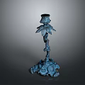 Blue Metal Candlestick With Intricate Floral Design And Decorative Base