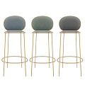 Three Stylish Bar Stools With Round Velvet Backrests And Gold Metal Frames