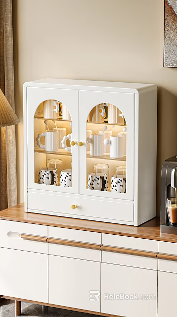 White Display Cabinet With Glass Doors Showcasing Decorative Mugs And Ornament Sets 3d model 