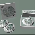Chinese Green Tea Cakes In Opened White Boxes With Traditional Landscape Art