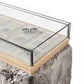 Display Showcase With Rock Texture Base Transparent Glass Top And Wooden Compartments