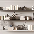 Stylish Decorative Ornament Collection with Books Sculptures Geometric Decor and Statues on Display Shelves