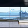 Modern Library Building Showcasing Glass Curtain Wall Roof Design and Green Lawn with Water Pool