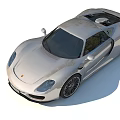 Silver Porsche Sports Car Featuring Sleek Design Front Fascia And Alloy Wheels