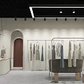 Clothing Store Modern Interior With Clothing Racks Apparel Display And Bench Seating