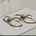 Soft Comfortable Cream Slippers On Beige Woven Home Floor Mat