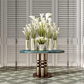 White Calla Lilies in Transparent Vases on Round Blue Glass Table with Metal Base