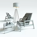 Wooden Outdoor Table With Gray Cushioned Chairs Blue Pillows And Floor Lamp
