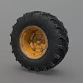 Black Off Road Tire With Yellow Rim And Heavy Duty Tread Pattern