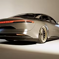 Modern Silver Sleek Sedan With Streamlined Body And Gold Alloy Wheels Design