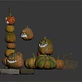 Tower Of Stacked Carved Halloween Pumpkins With Smiley Faces And Hay Decorations