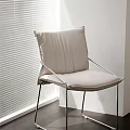 Light Upholstered Accent Chair With Metal Frame In Modern Room With Window Blinds Natural Light