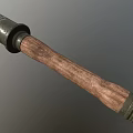 Vintage Military Weapon Featuring Cylindrical Metal Top And Wooden Handle Design