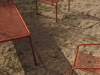 Outdoor Red Woven Table and Chair Set on Sandy Ground with Grass and Sunlight Shadows 3d model