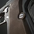 Vintage Metal Handgun With Detailed Muzzle Design Wooden Grip And Classic Structure