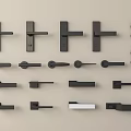 Black Door Handles With Various Modern Designs And Styles On Beige Background