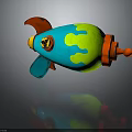 Colorful Toy Bomb Weapon Featuring Blue Green Orange Splatter Design