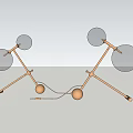 Modern Adjustable Desk Lamps With Golden Stands Transparent Shades And Spherical Bases