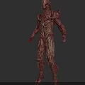 3D Rendered Horror Creature Character With Red Flesh And Twisted Biological Structure