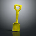 Bright Yellow Plastic Toy Shovel For Kids Play Activities On Gray Surface