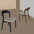 Modern Minimalist Dining Chairs With Black Brown Frames And White Cushions In Bright Room
