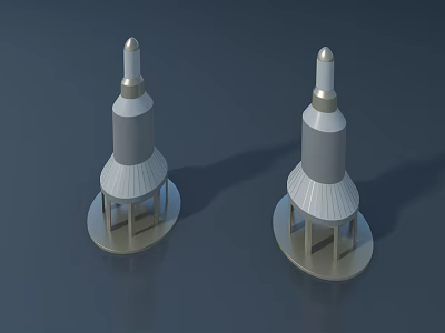 Two Gray Tower Shaped Objects With Layered Design And Spiked Tops On Base 3d model