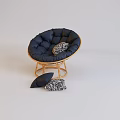 Navy Blue Round Lounge Chair With Rattan Frame And Patterned Cushions
