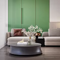 Light Gray Sofa and Round Coffee Table Set with Brown Cushion White Flowers and Green Wall