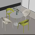 Modern Round White Table And Chair Set With Yellow White Chairs Potted Plant By Window