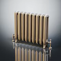 Brass Vertical Radiator With Classic Design And Decorative Valves On Reflective Surface