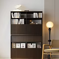 Modern Dark Brown Bookshelf With Layered Books Decorative Items Cabinets Floor Lamp And Chair