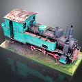 Vintage Teal Rusted Steam Train Model With Green Grass Base And Detailed Exterior