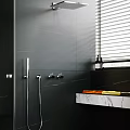 Sleek Shower System with Handheld Sprayer in Dark Gray Tiled Bathroom with Marble Countertop