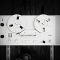 Vintage White Audio System with Headphones on Shelf and Vinyl Records