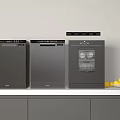 Modern Black Kitchen Appliances On White Countertop With Gray Cabinets And Yellow Lemons