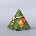 Traditional Chinese Zongzi Wrapped in Green Bamboo Leaves with Salted Egg Yolk Fillings