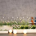 Beautiful Green Grass White Blooms Pink Flowers in White Planters with Glowing Lights Rabbit Decor