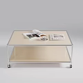Contemporary Coffee Table With Metal Frame Light Top Featuring Magazines And Remote 3d model