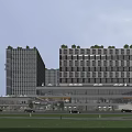 Modern High Rise Hotel Building With Glass Facade Green Roof And Exterior Cars
