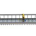 Industrial Factory Building Structure With Elongated Continuous Platform Yellow Machinery And Safety Railing